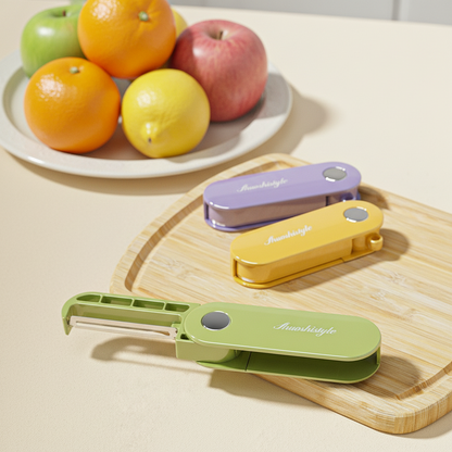 économe cuisine vert jaune violet pliable ultra compact